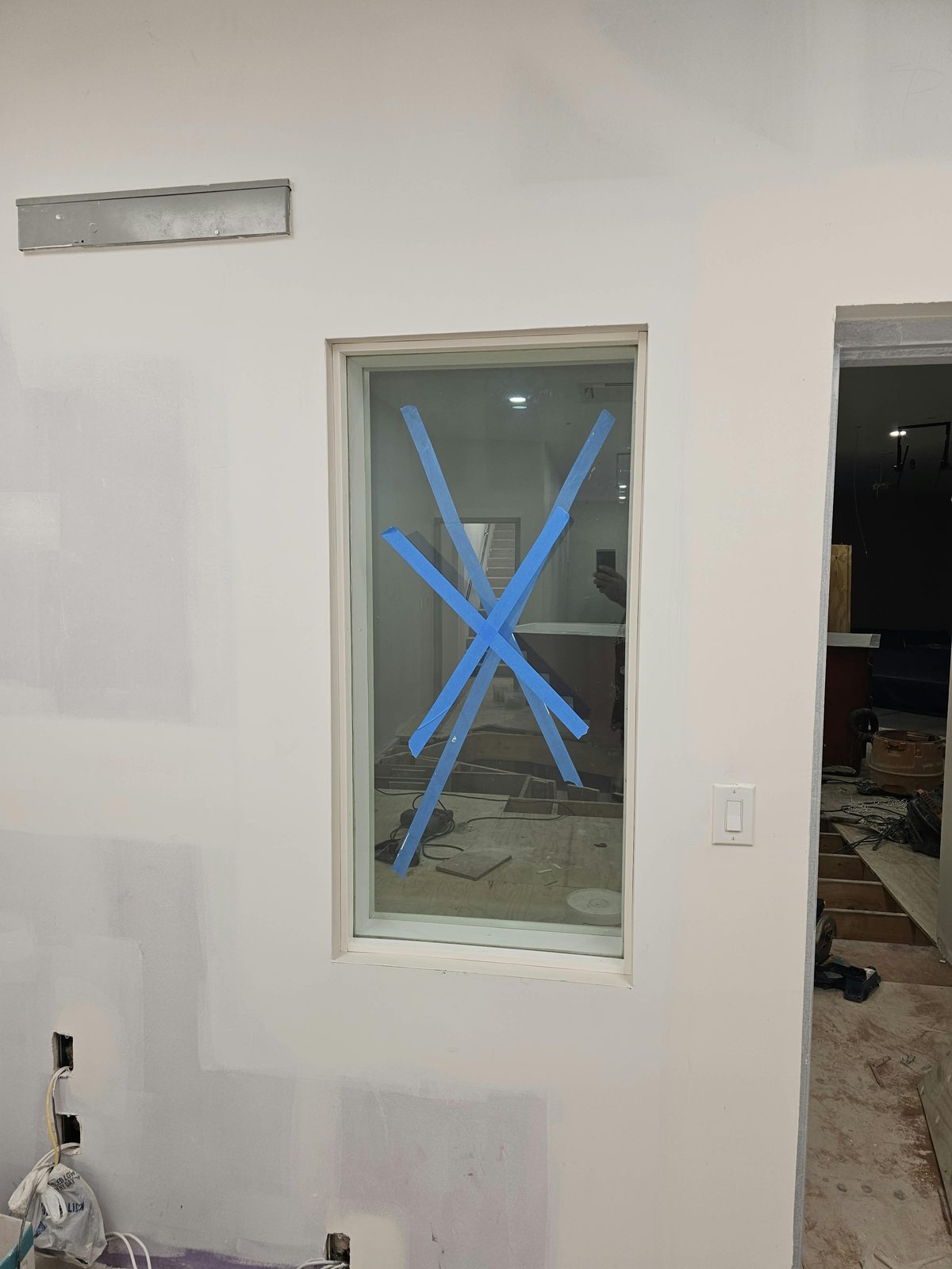 The same acoustic window seen from the room still under construction at 1763 Amsterdam Avenue, showing the depth of the frame
