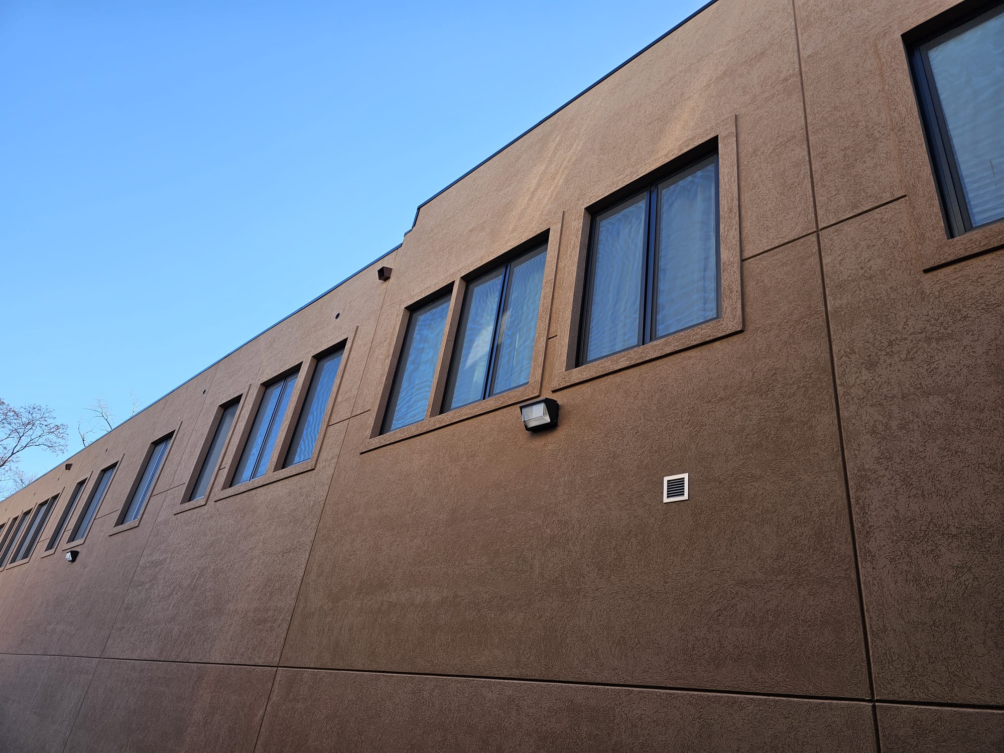 Aluminum windows with insulated glass on the commercial facade, 217 Main Street, Staten Island