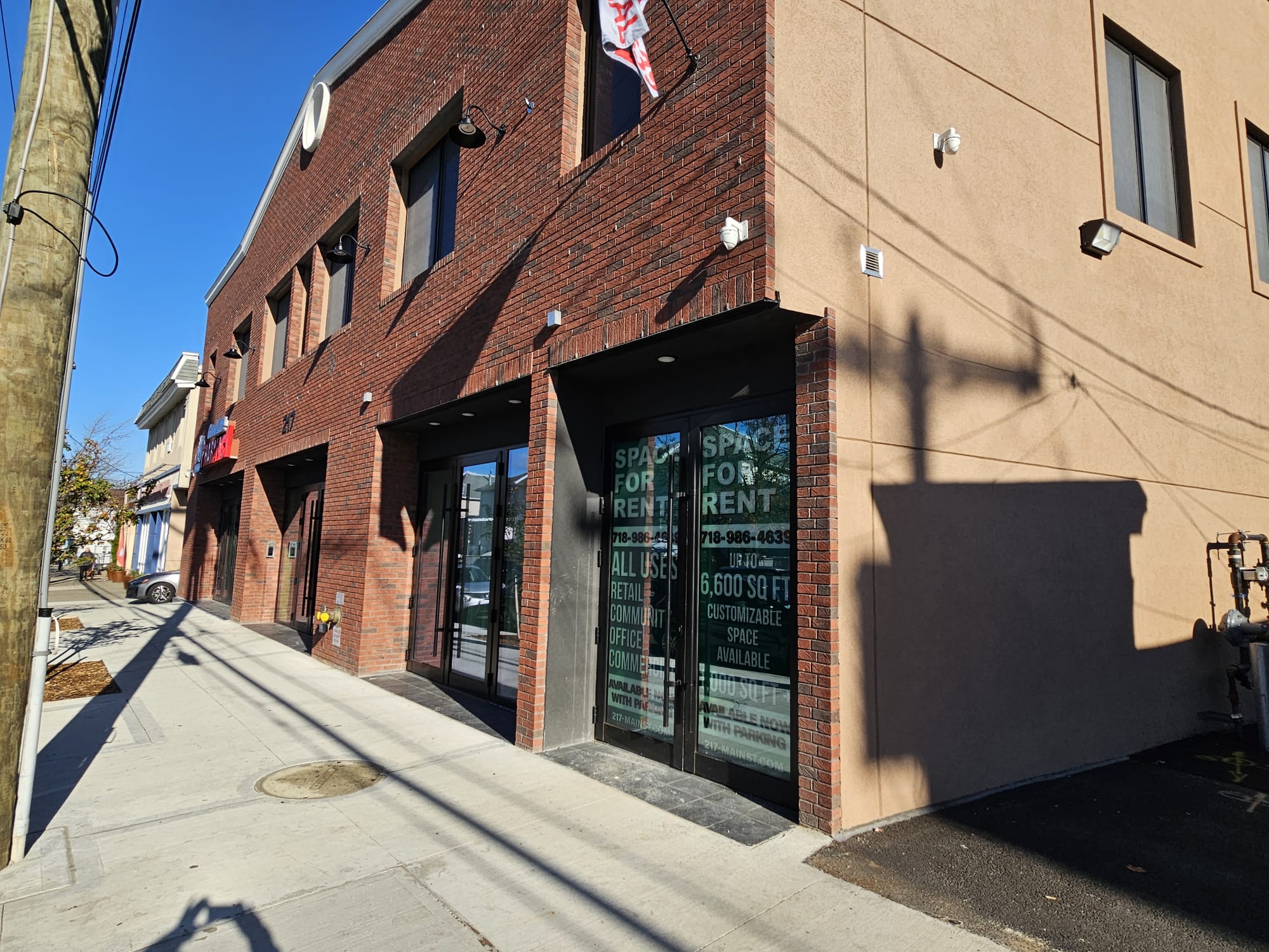 Retail storefront windows and doors at 217 Main Street, Staten Island