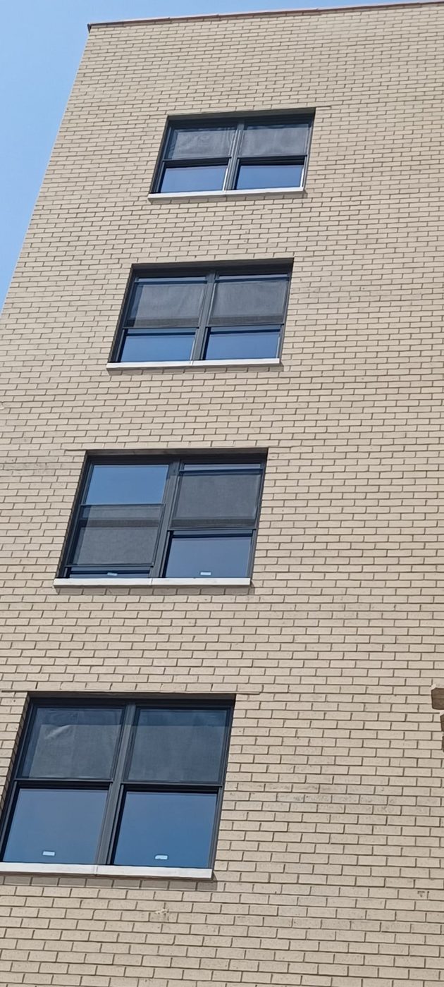Side elevation of 25 Franklin Boulevard with new Crystal aluminum windows on four floors