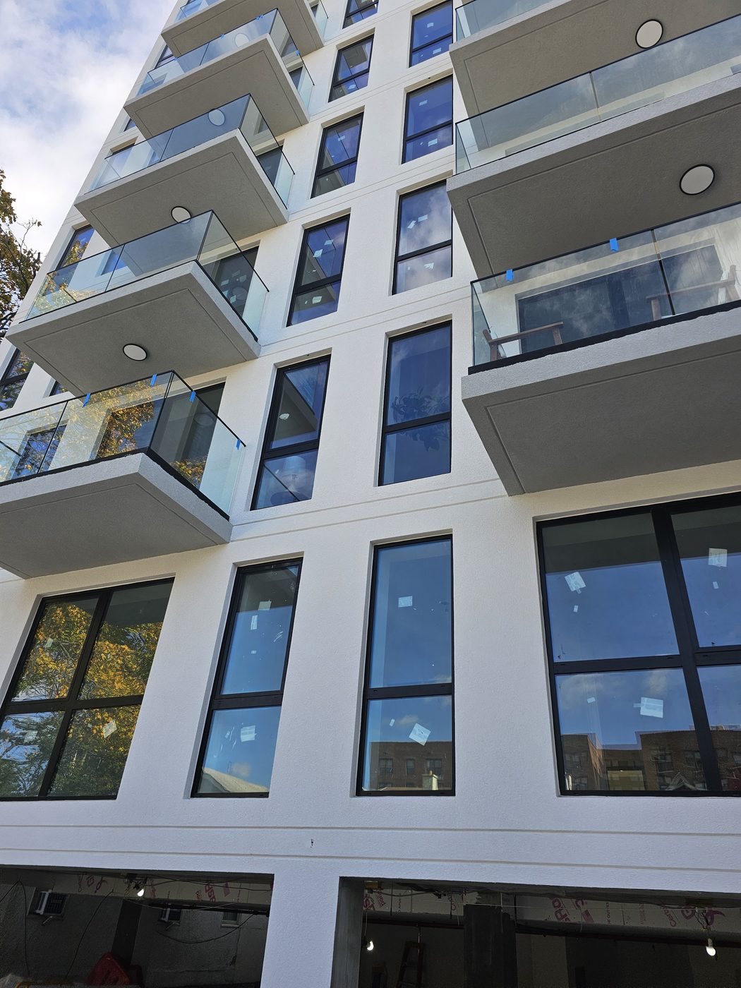 Close view of balcony doors and fixed and operable aluminum windows, 2518 Ocean Avenue, Brooklyn