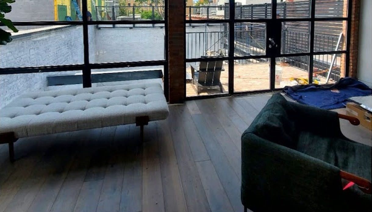 Steel-framed glass doors and windows opening to a terrace at 266 Bond Street, Brooklyn