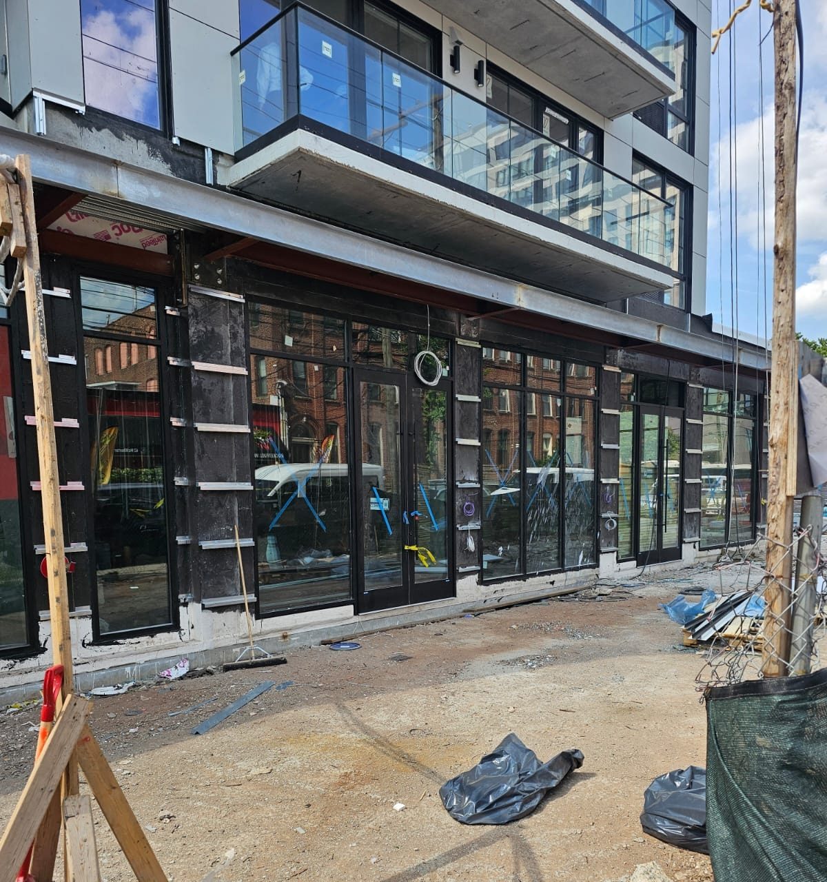 Gamco aluminum storefront with Solarban 60 glass along the street at 66 McWhorter Street, Newark