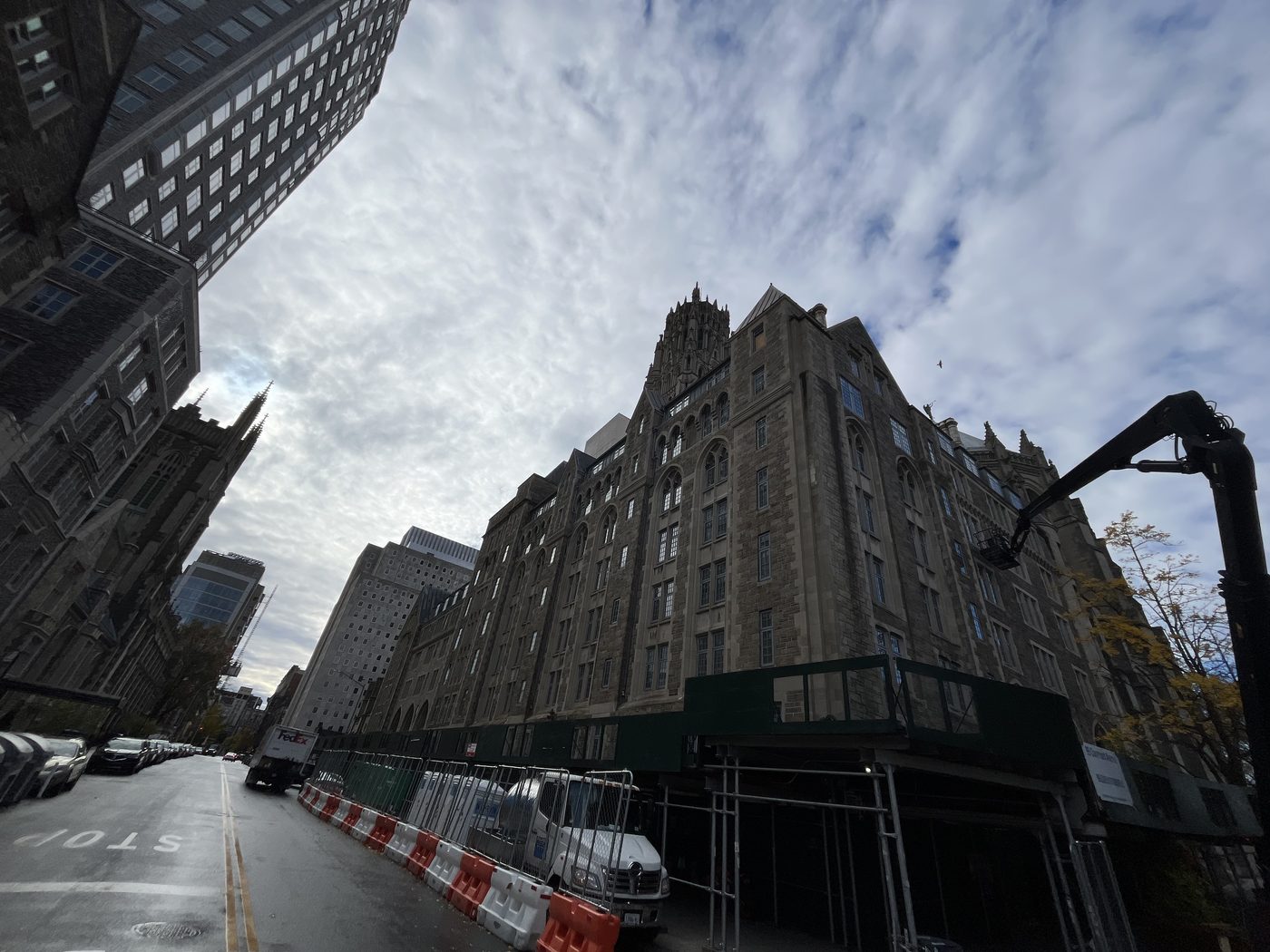 99 Claremont Avenue, Manhattan, seen from the street with the tower of Riverside Church rising behind