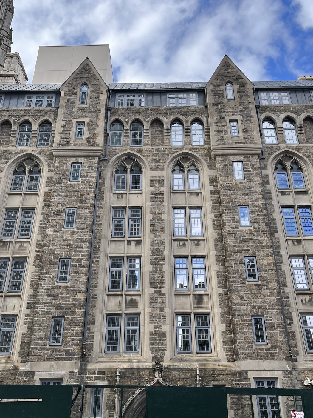 Full-height view of the Gothic window bays with new divided-lite aluminum windows, 99 Claremont Avenue, Manhattan