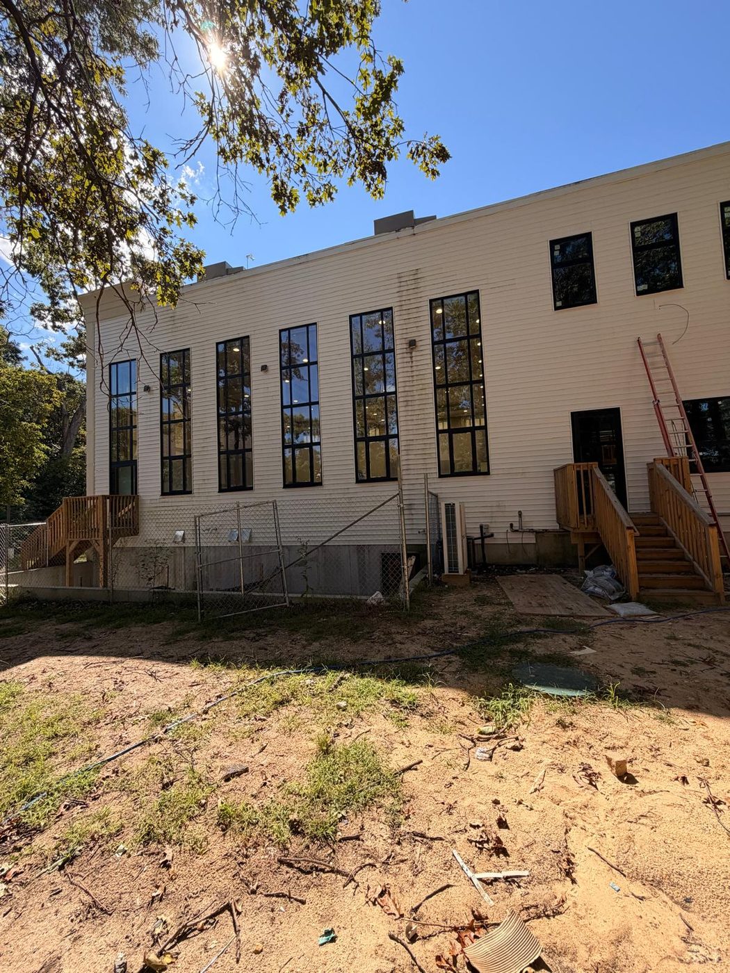 Rear elevation showing the full run of replacement windows &mdash; Lakewood, New Jersey