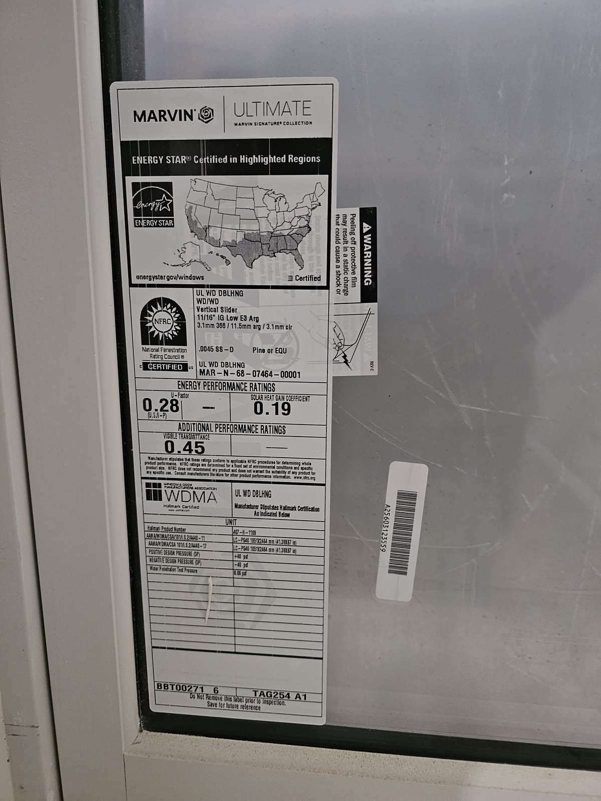 NFRC and ENERGY STAR label on a Marvin Ultimate wood double-hung showing U-factor 0.28 and SHGC 0.19