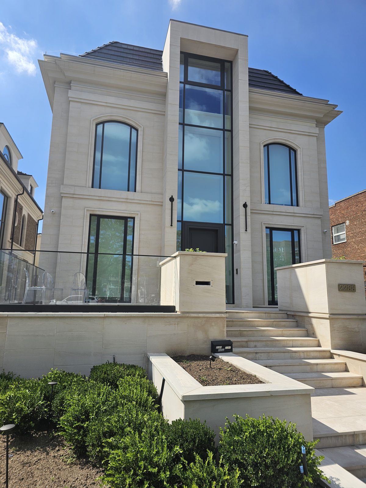 Front left view with terrace glass guard and glazed entry slot