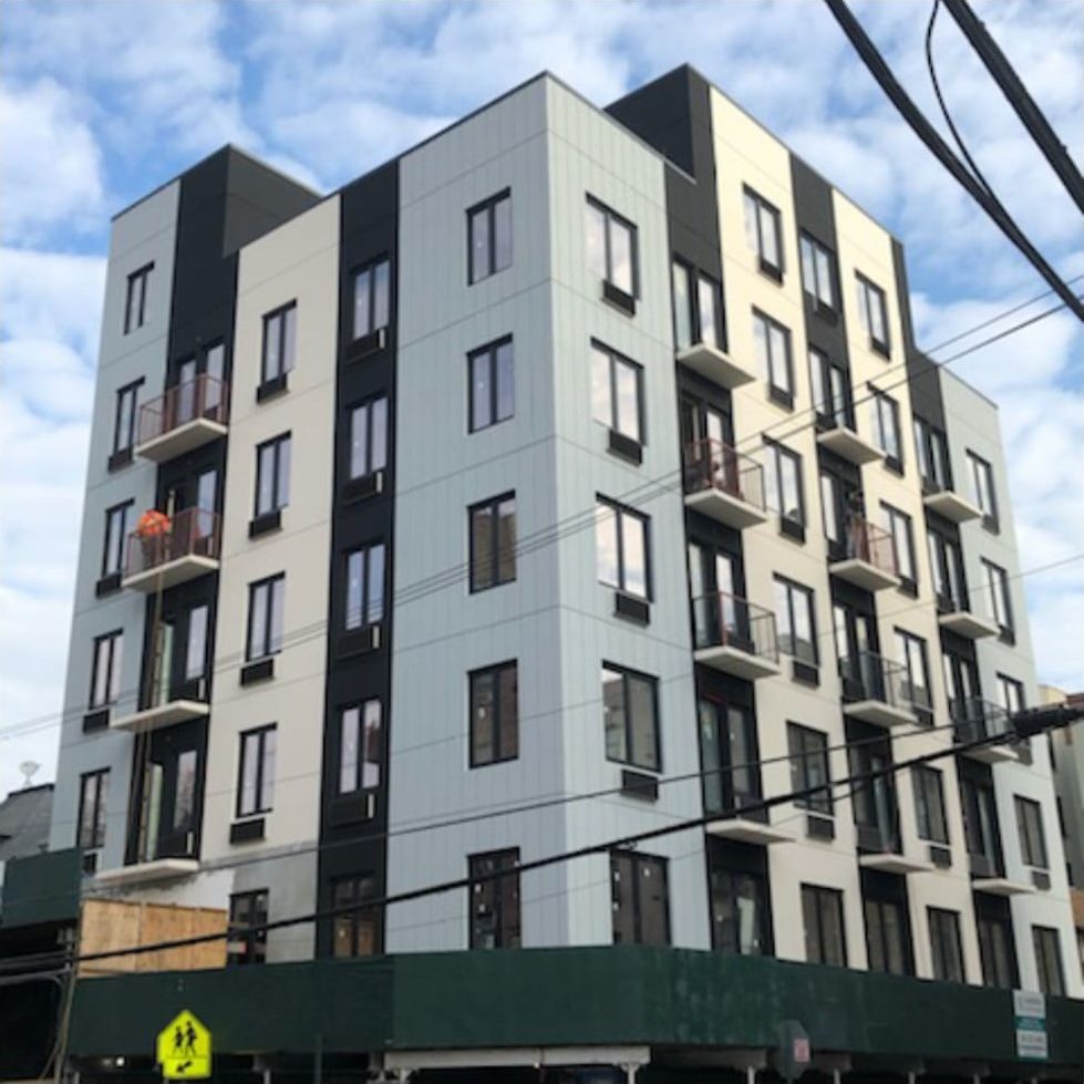 The Elston, Woodycrest Avenue at West 164th Street, Bronx: new apartment building with Aluplast uPVC windows in black bands across a panel facade