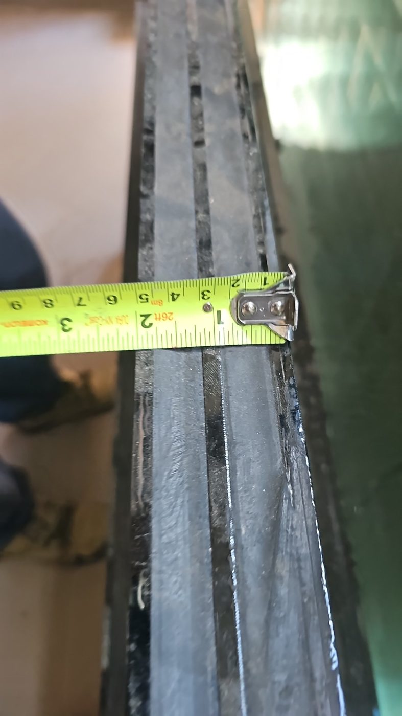 Edge of a triple insulating glass unit, three lites and two cavities, the glazing used in passive house windows